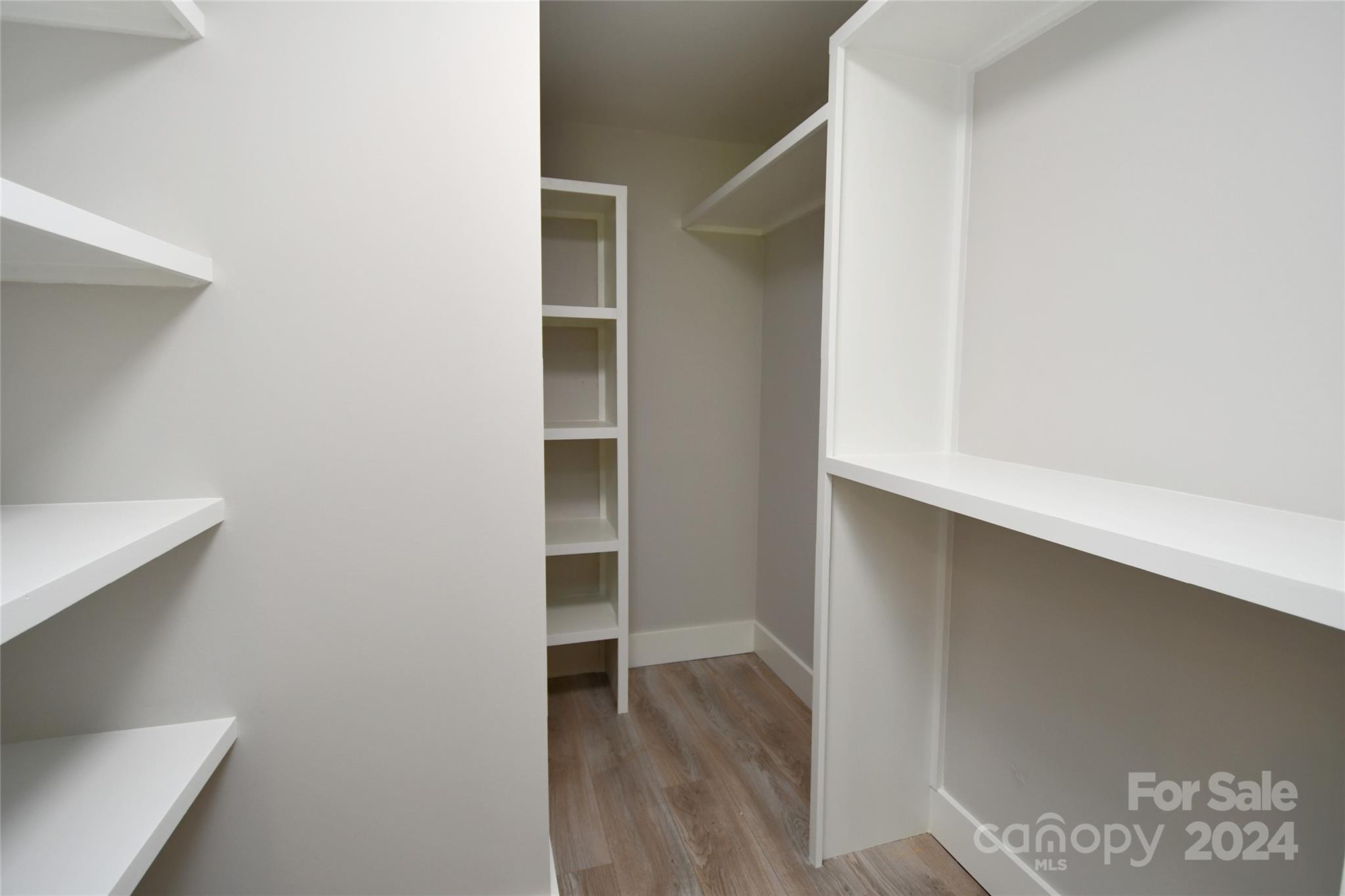 18 Rocky Slope Road Asheville, NC 28804 - Photo 18 of 41 a view of walk in closet with empty racks