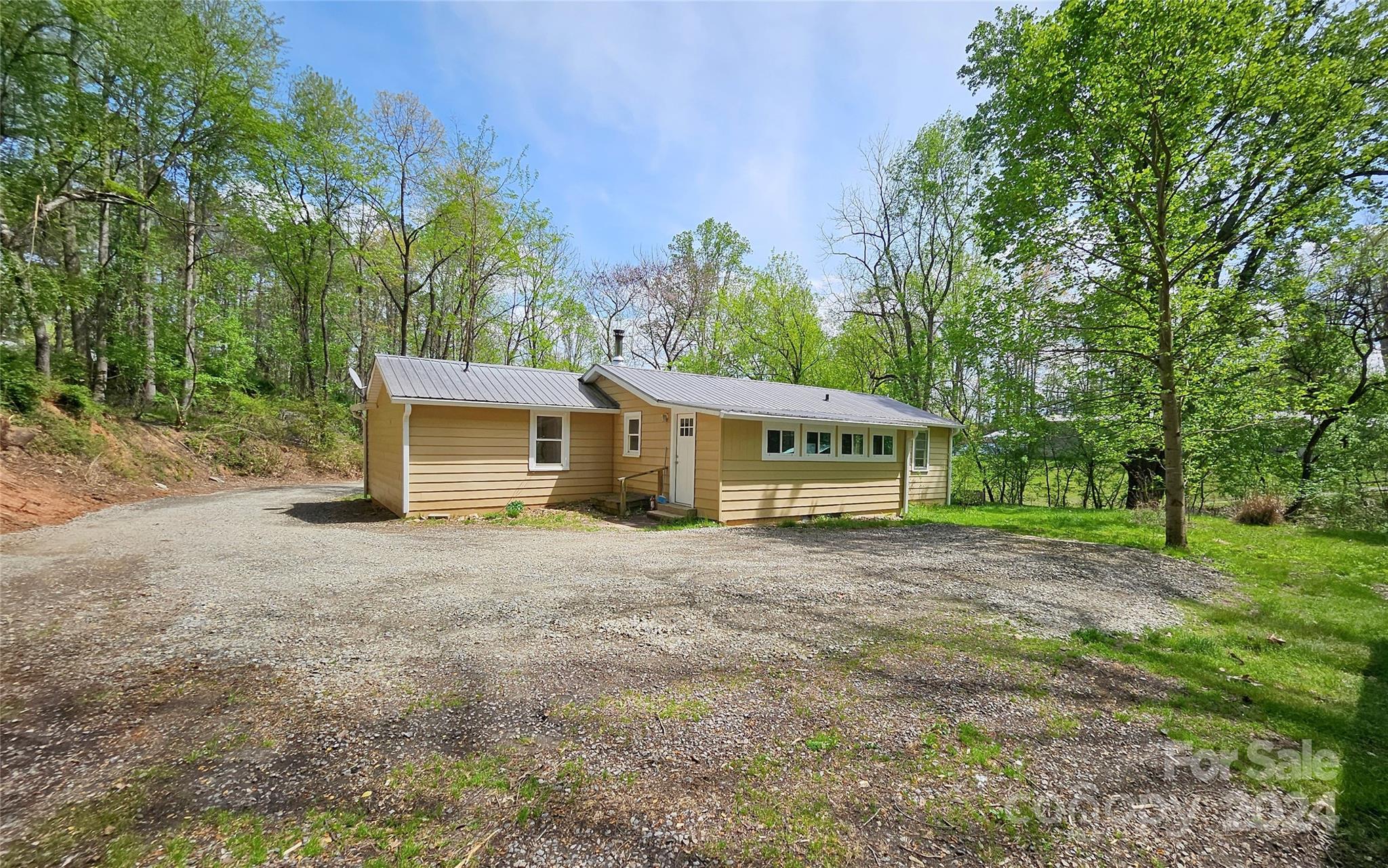 18 Rocky Slope Road Asheville, NC 28804 - Photo 25 of 41 a house with trees in the background