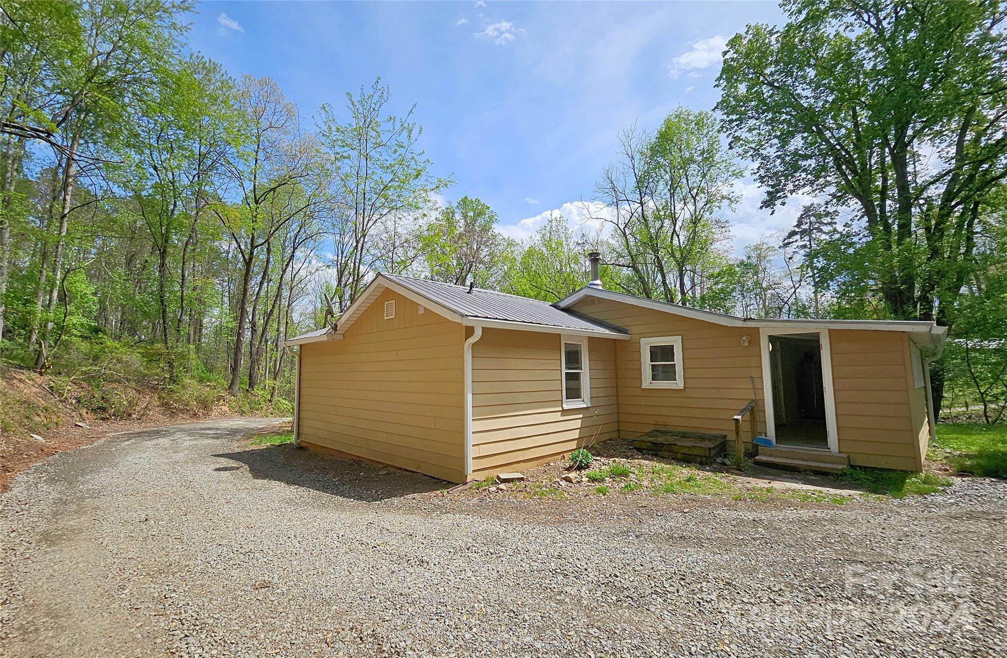 18 Rocky Slope Road Asheville, NC 28804 - Photo 26 of 41 a view of a house with a yard and large tree