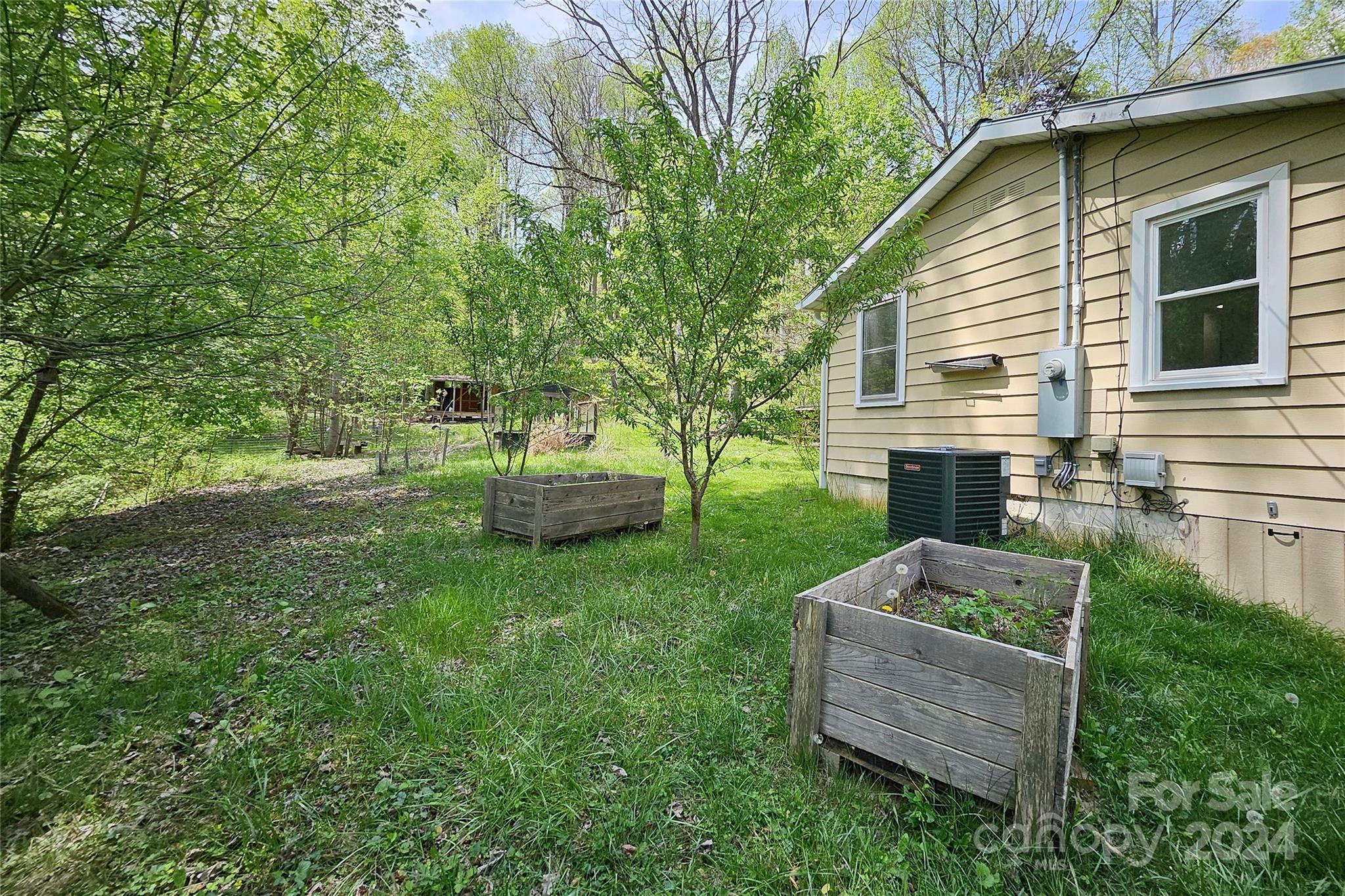 18 Rocky Slope Road Asheville, NC 28804 - Photo 28 of 41 a view of a house with a backyard