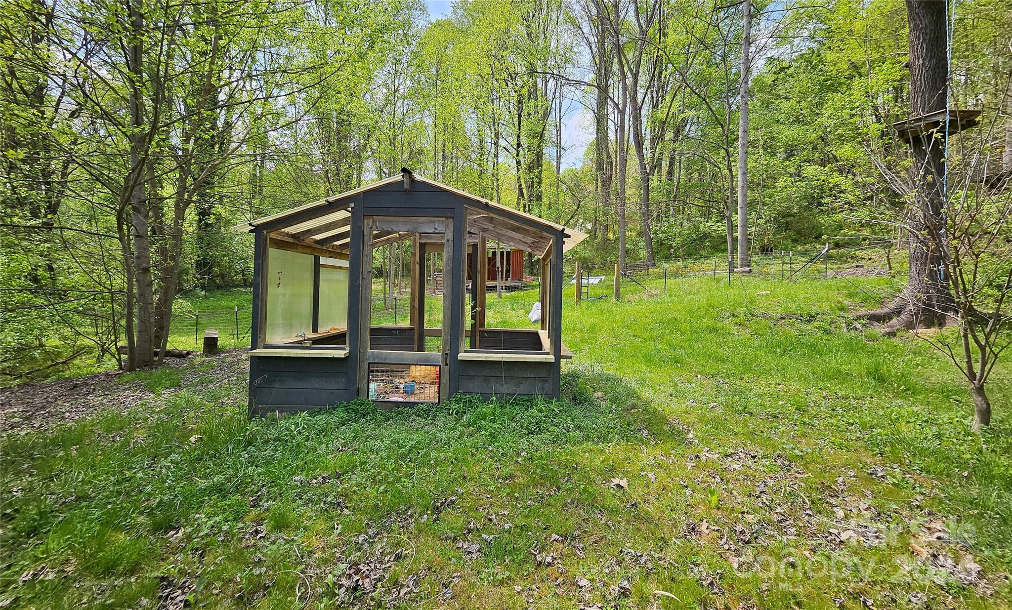 18 Rocky Slope Road Asheville, NC 28804 - Photo 39 of 41 a view of a house with a yard and sitting area