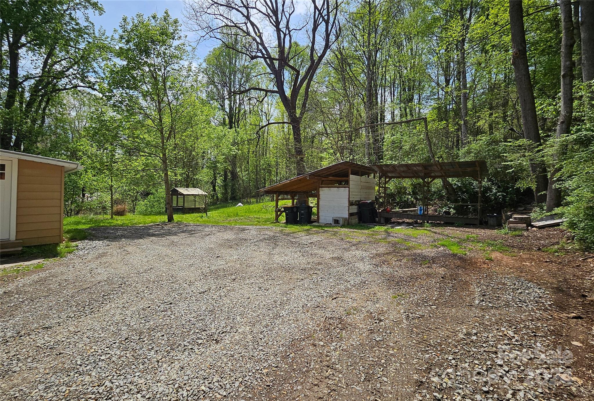 18 Rocky Slope Road Asheville, NC 28804 - Photo 41 of 41 a view of a house with backyard and trees