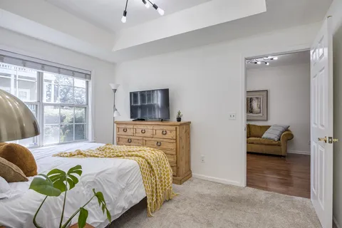 a bedroom with a bed and furniture