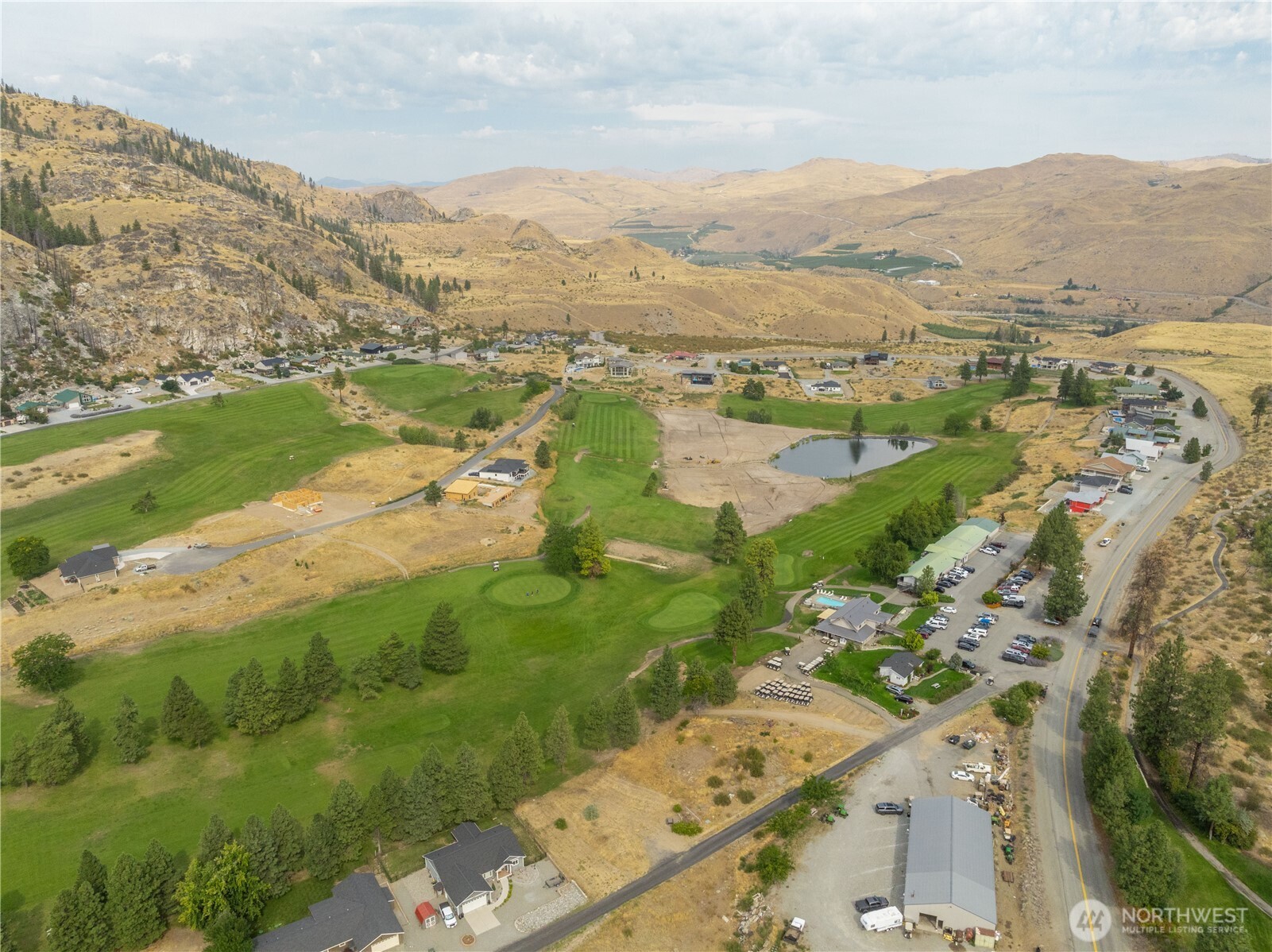 103 Golf Course Drive Pateros, WA 98846 - Photo 22 of 24 an aerial view of mountain with residential house and ocean view