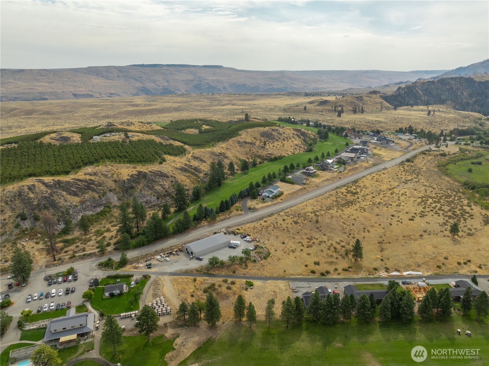 103 Golf Course Drive Pateros, WA 98846 - Photo 23 of 24 a view of a lake with a mountain