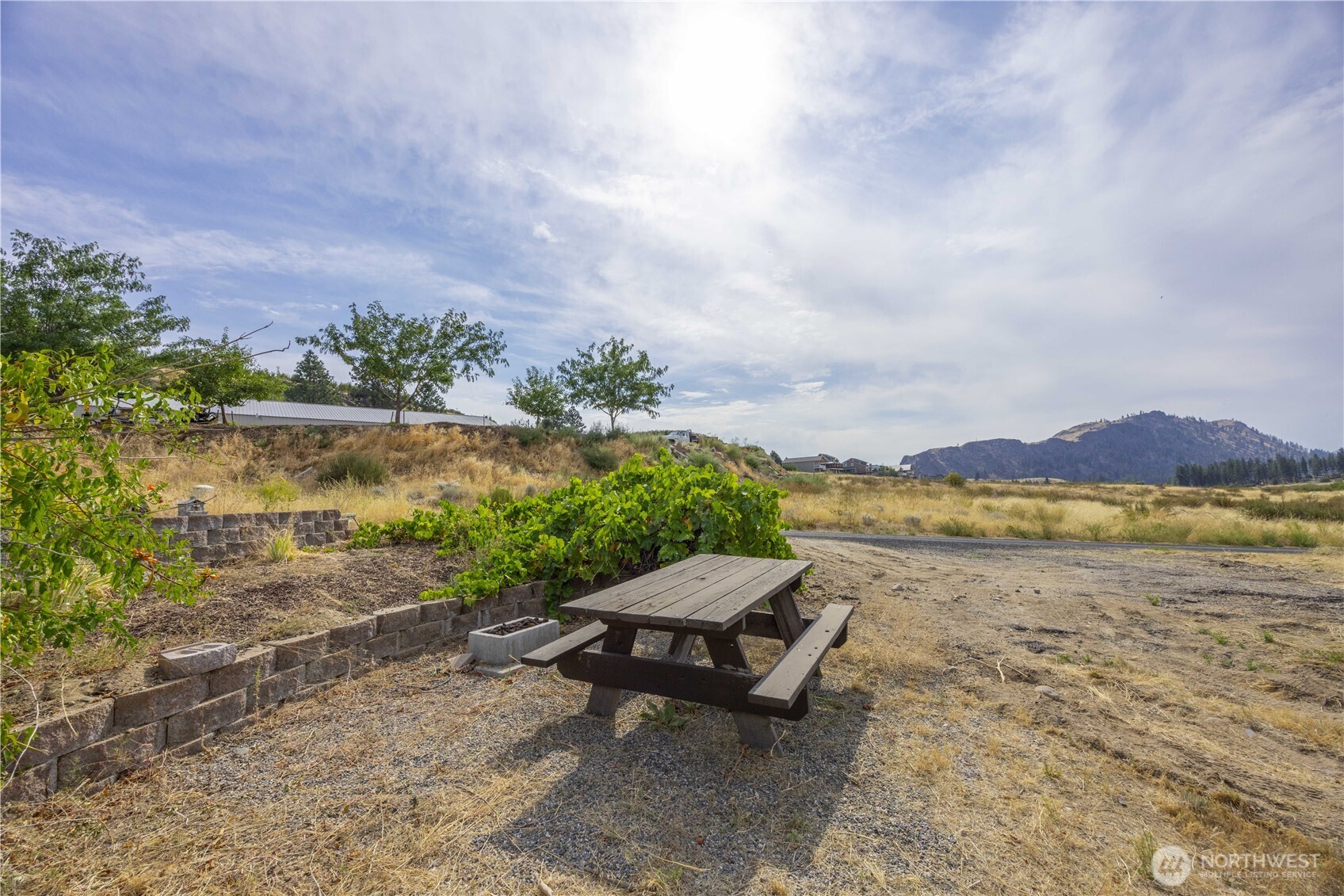 103 Golf Course Drive Pateros, WA 98846 - Photo 9 of 24 a view of lake with mountain in the background