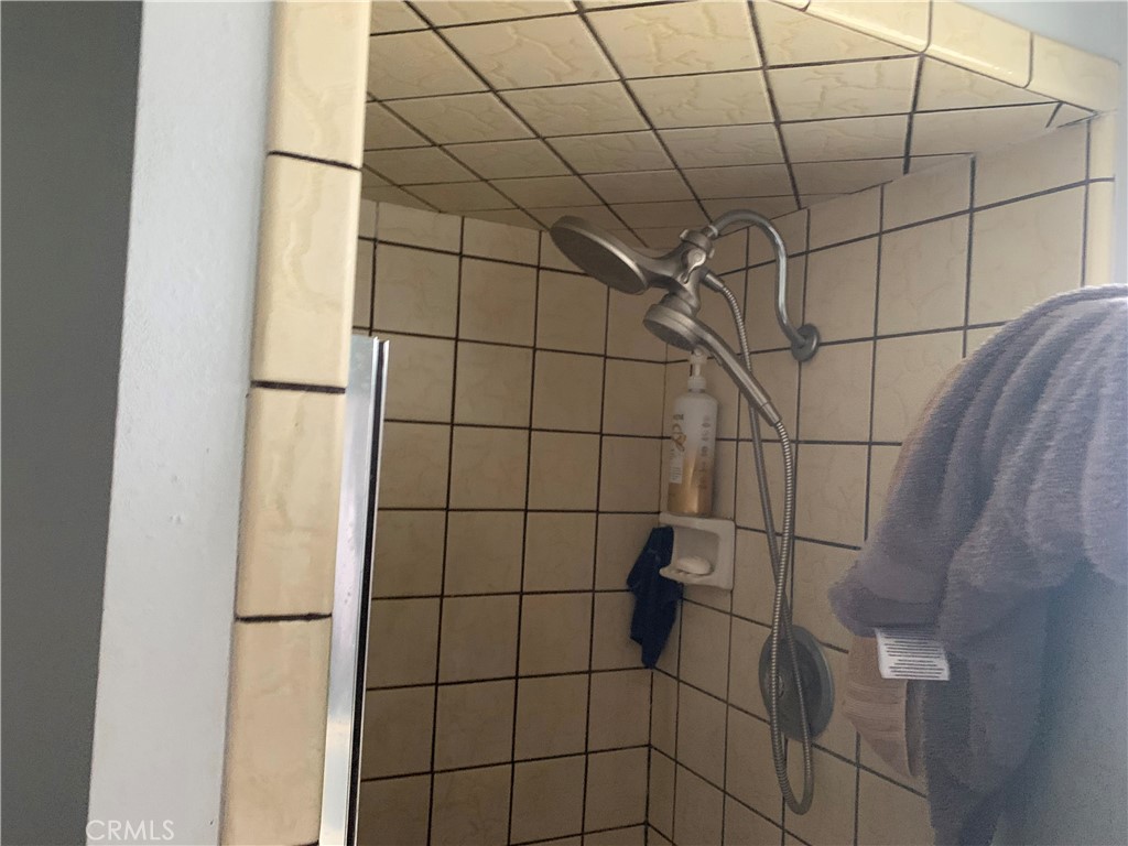 2757 Branco Avenue Merced, CA 95340 - Photo 11 of 24 a bathroom with a shower