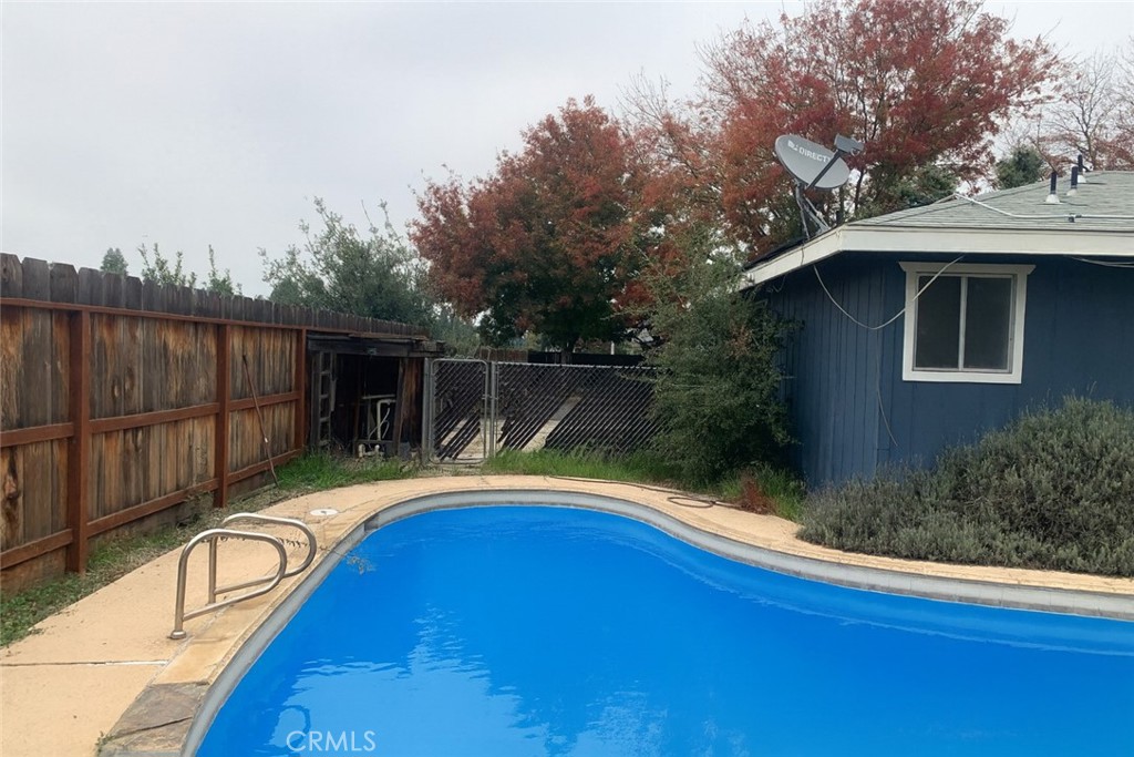 2757 Branco Avenue Merced, CA 95340 - Photo 23 of 24 a view of a backyard with swimming pool
