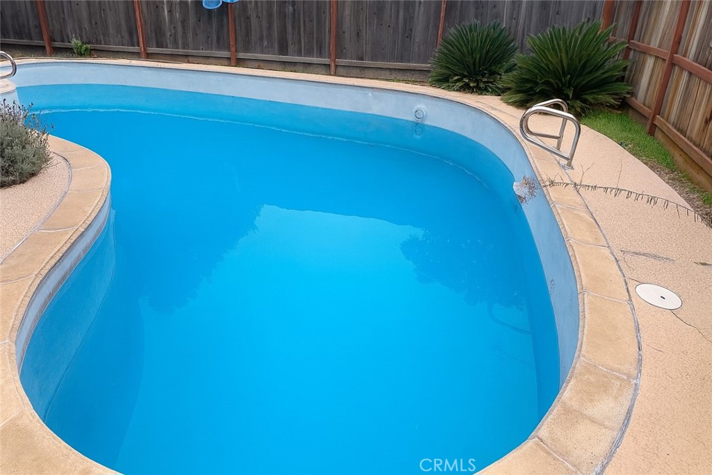 2757 Branco Avenue Merced, CA 95340 - Photo 24 of 24 a view of a swimming pool from a balcony