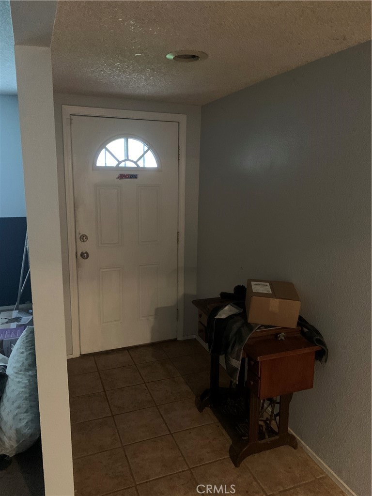 2757 Branco Avenue Merced, CA 95340 - Photo 8 of 24 a room with storage and utility