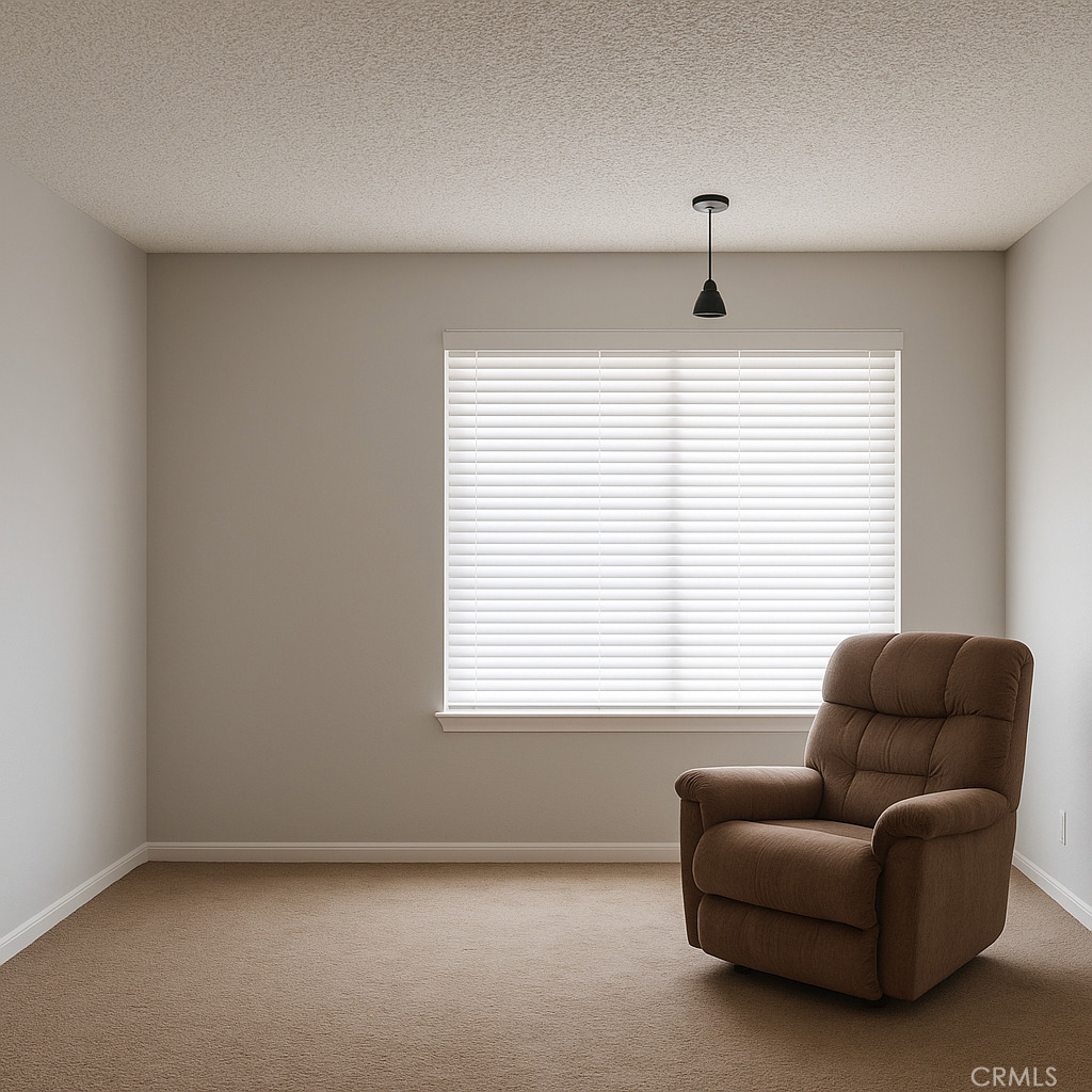 2757 Branco Avenue Merced, CA 95340 - Photo 10 of 24 a living room with furniture and a window