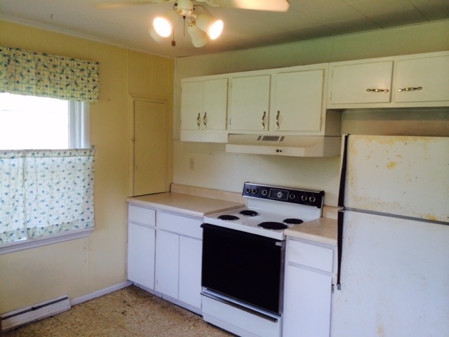 28243 West Fox River Road Cary, IL 60013 - Photo 2 of 9 a kitchen with stainless steel appliances granite countertop a stove a sink and a refrigerator