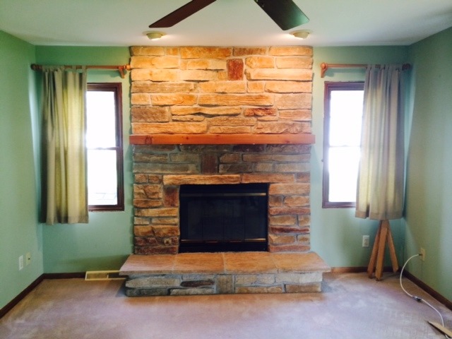 28243 West Fox River Road Cary, IL 60013 - Photo 5 of 9 a living room with fireplace