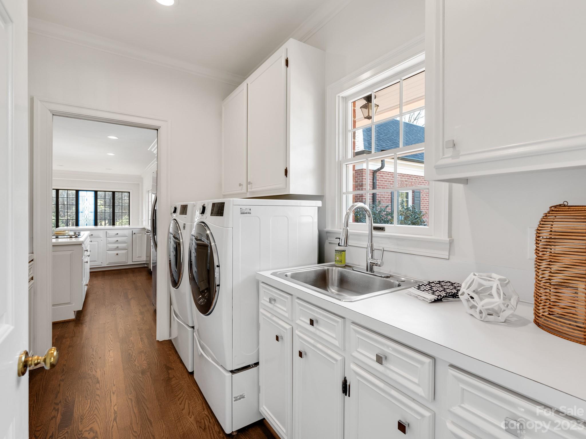 1150 Concord Road Davidson, NC 28036 - Photo 21 of 39 a kitchen with refrigerator and cabinets