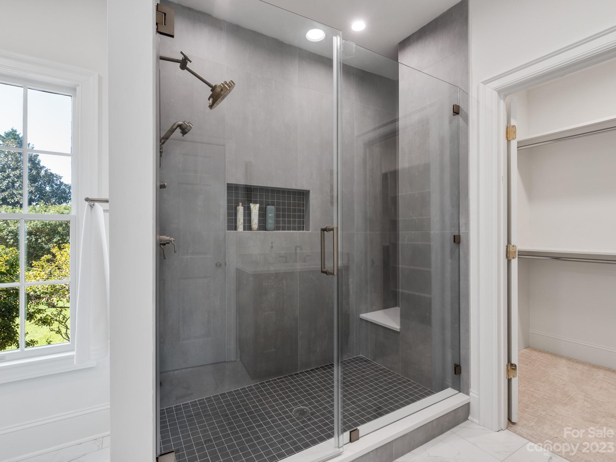 1150 Concord Road Davidson, NC 28036 - Photo 32 of 39 a bathroom with a shower and a sink