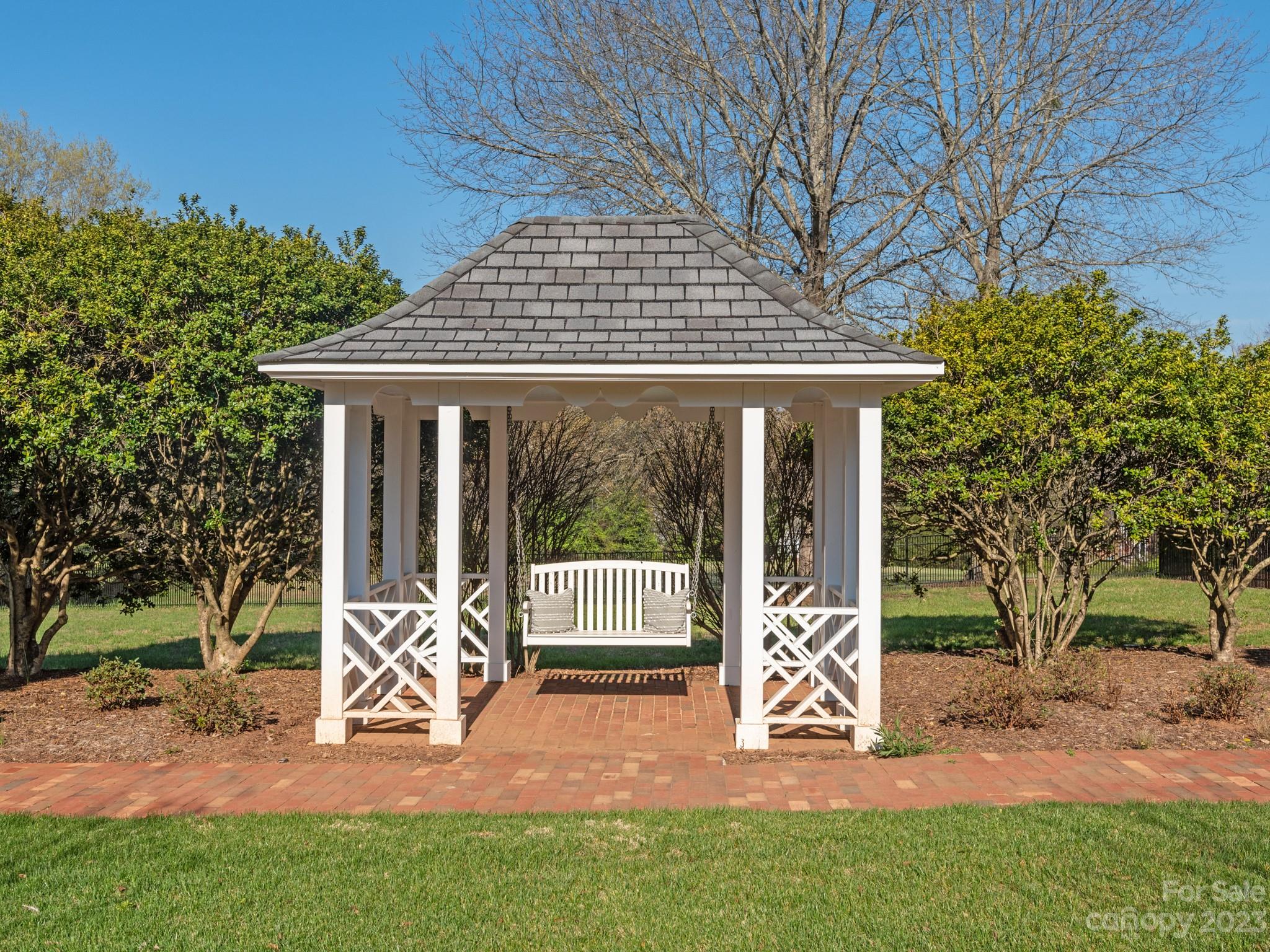 1150 Concord Road Davidson, NC 28036 - Photo 38 of 39 a front view of a house with garden