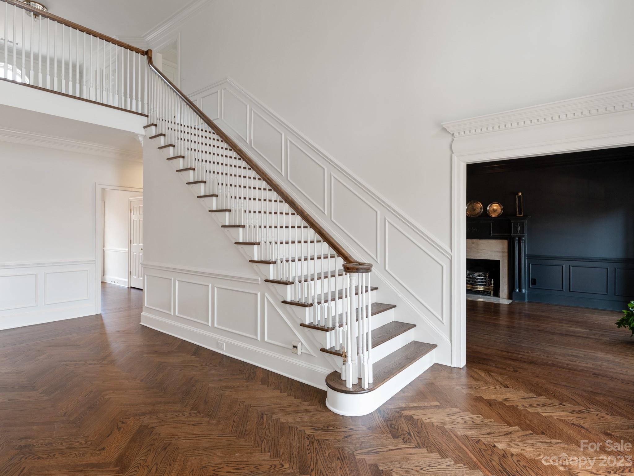 1150 Concord Road Davidson, NC 28036 - Photo 6 of 39 a view of entryway and hall with wooden floor