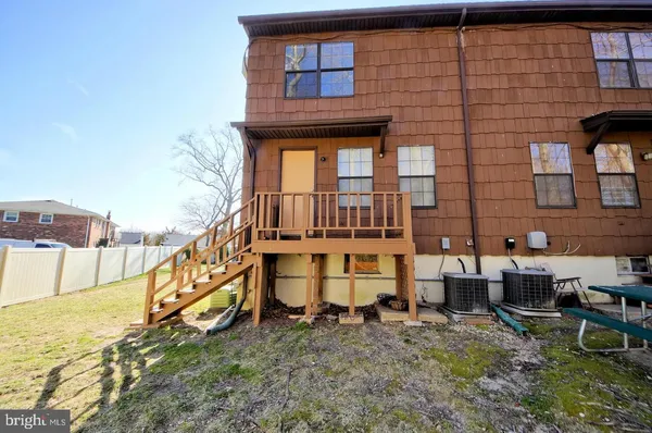 a view of a backyard of the house