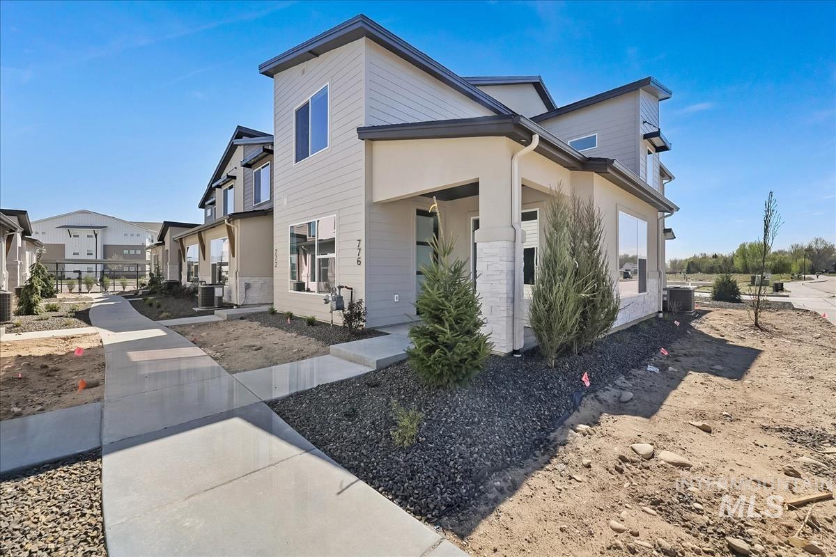 776 South Calhoun Lane Star, ID 83669 - Photo 42 of 49 Contemporary multi-story exterior featuring light-toned siding and dark trim accents