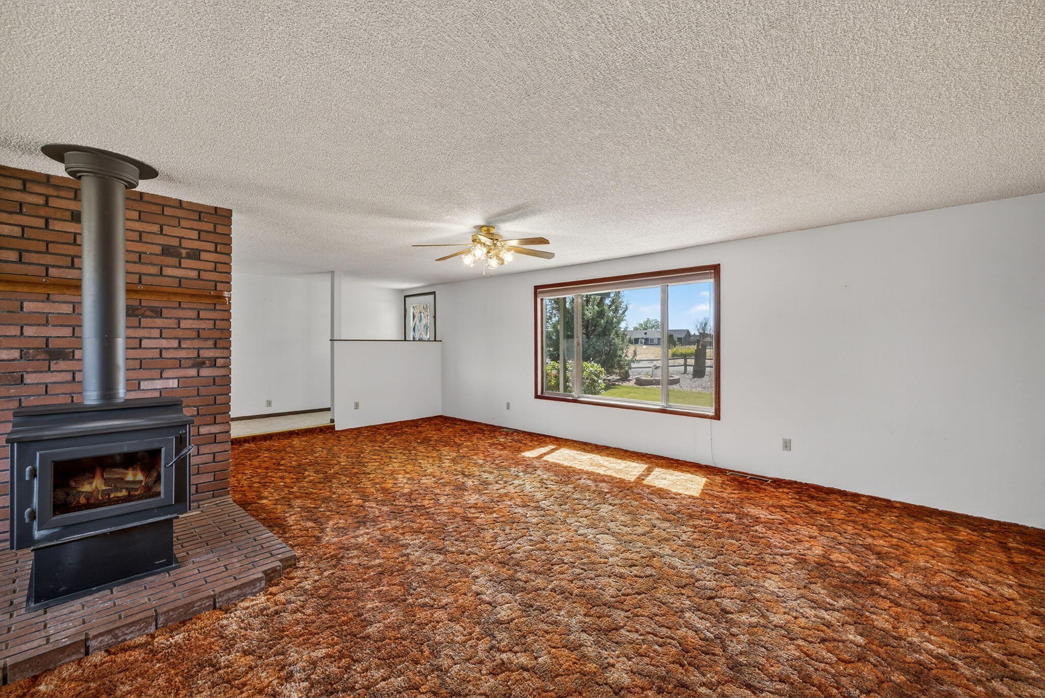 951 Southeast Rancho Lane Madras, OR 97741 - Photo 9 of 48 Living Room w/ Wood Stove