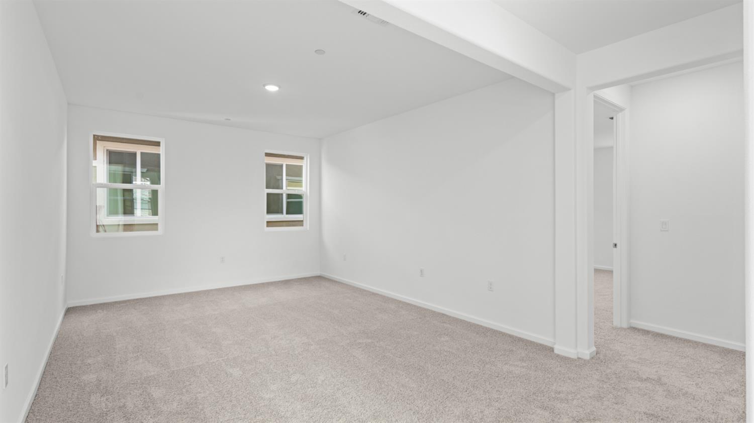 4261 Paisleyshire Way Rancho Cordova, CA 95742 - Photo 22 of 42 a view of an empty room with windows