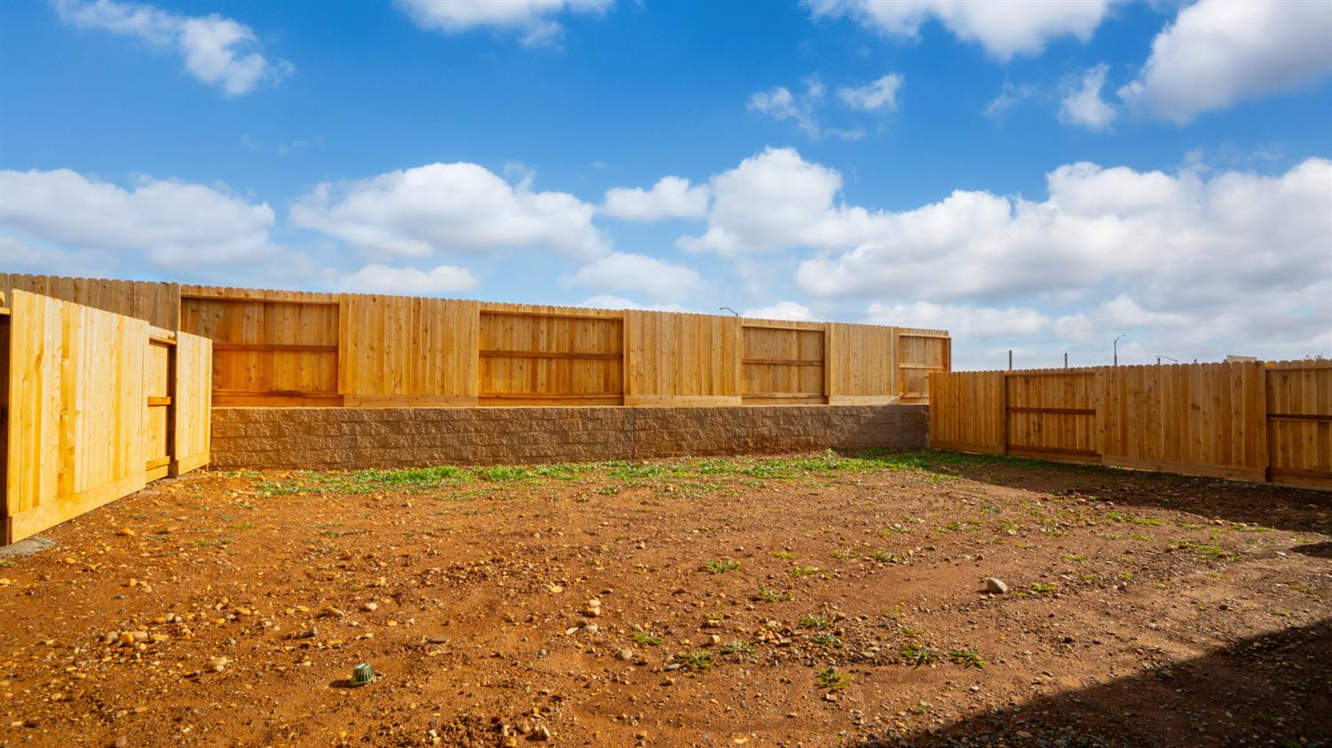 4261 Paisleyshire Way Rancho Cordova, CA 95742 - Photo 42 of 42 a view of an empty room with wooden floor and a fan
