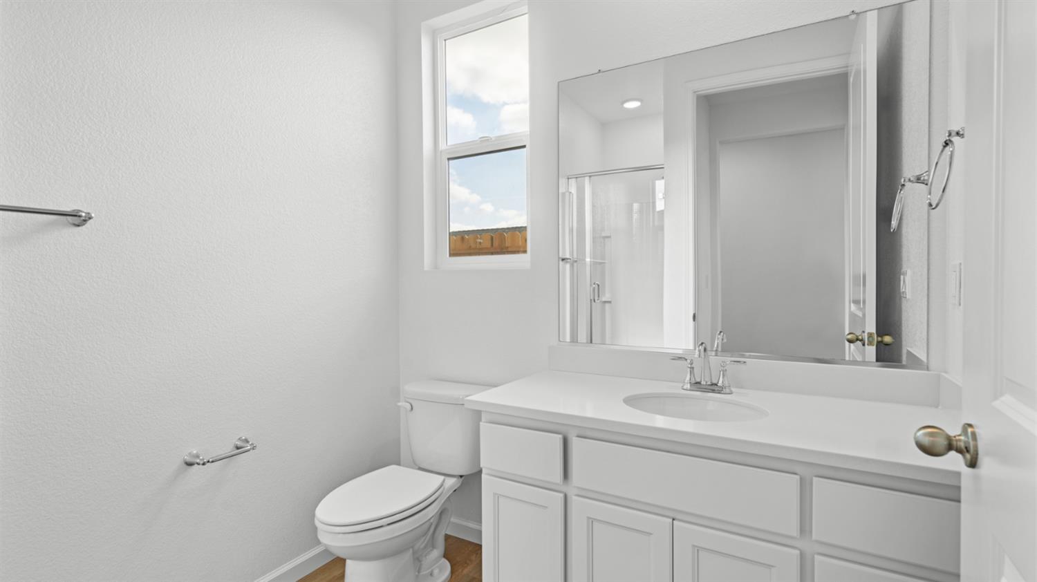 4261 Paisleyshire Way Rancho Cordova, CA 95742 - Photo 6 of 42 a bathroom with a sink toilet and a mirror