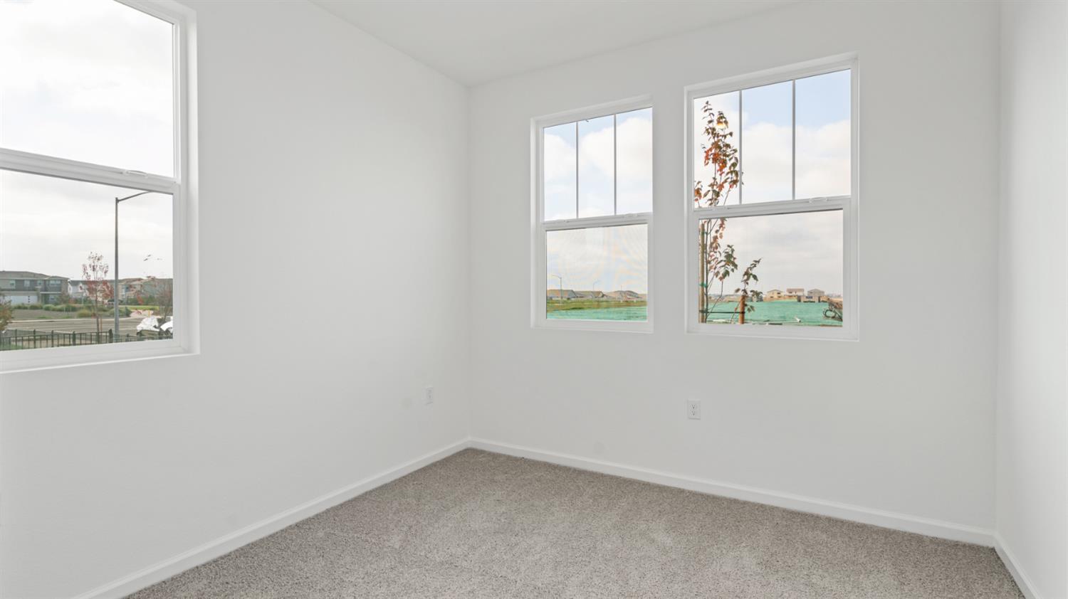 4261 Paisleyshire Way Rancho Cordova, CA 95742 - Photo 8 of 42 an empty room with windows