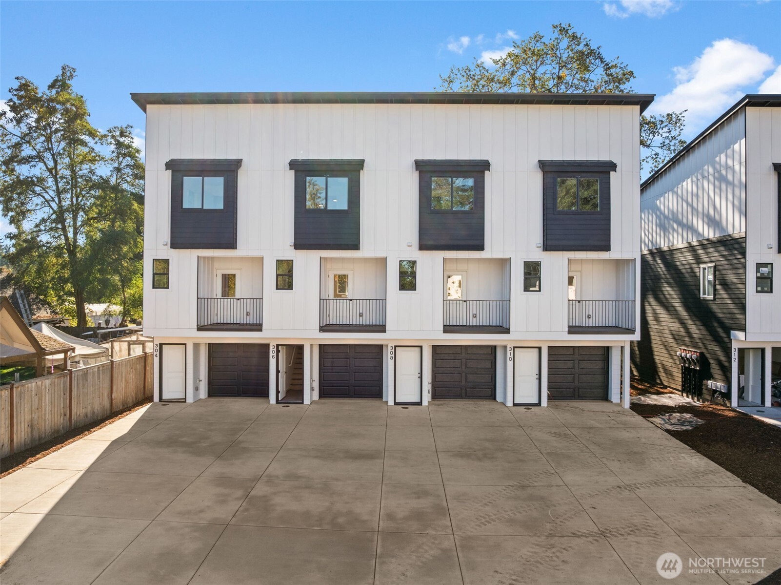 304 118th Street South, Unit 4 Tacoma, WA 98444 - Photo 1 of 37 a view of a house with a kitchen
