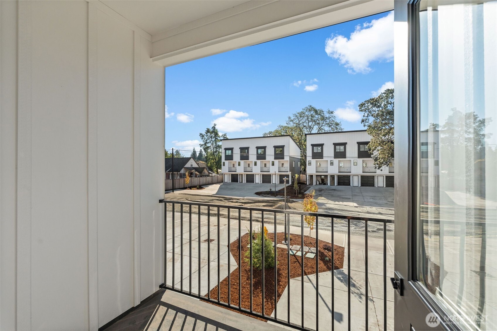 304 118th Street South, Unit 4 Tacoma, WA 98444 - Photo 15 of 37 a view of a balcony with city view