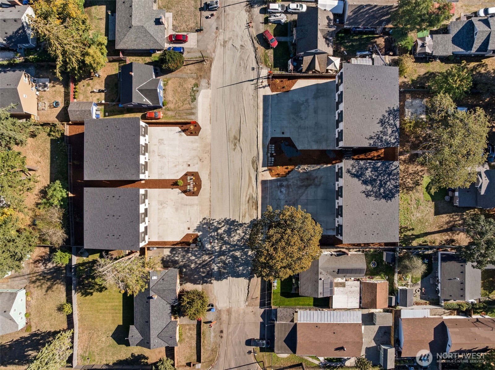304 118th Street South, Unit 4 Tacoma, WA 98444 - Photo 28 of 37 an aerial view of residential houses with outdoor space