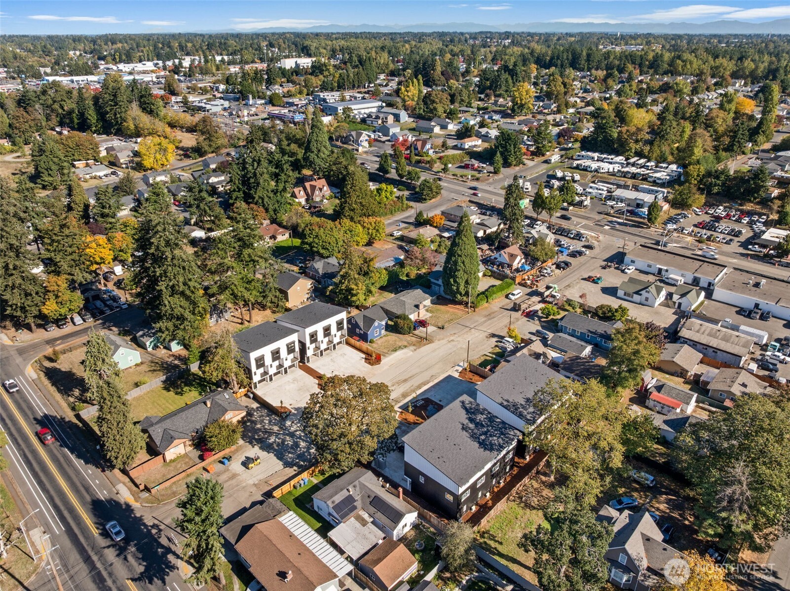 304 118th Street South, Unit 4 Tacoma, WA 98444 - Photo 33 of 37 an aerial view of residential building with parking
