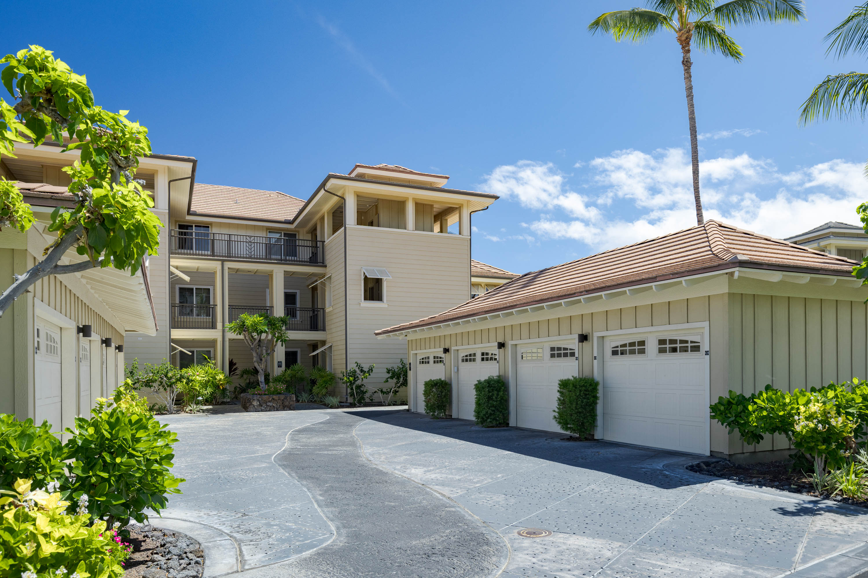 69-180 Waikoloa Beach Drive, Unit G33 Waikoloa, HI 96738 - Photo 17 of 30 a front view of a house with a garden
