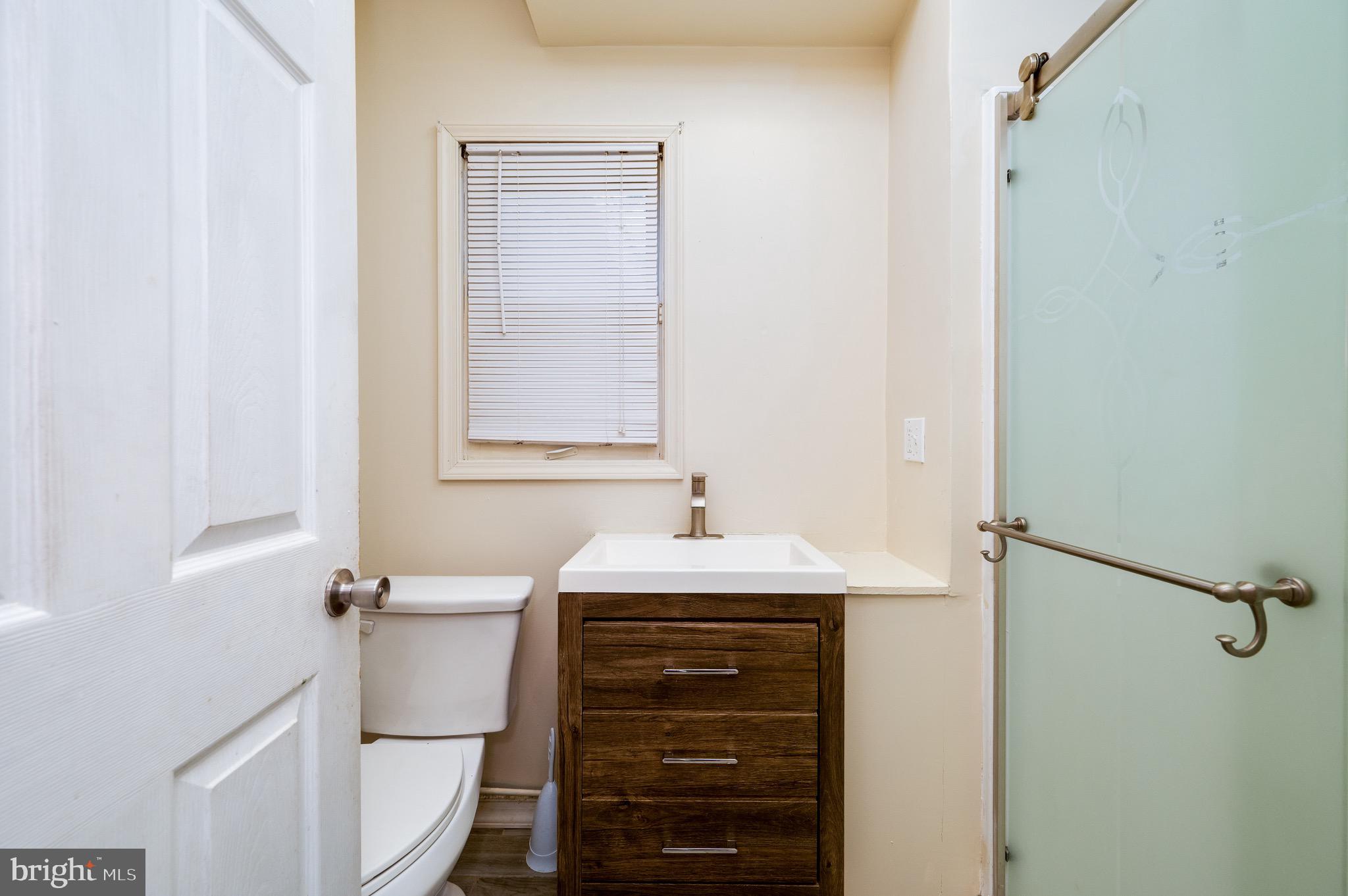 3019 Kutztown Road Reading, PA 19605 - Photo 33 of 52 a bathroom with a sink a toilet and shower