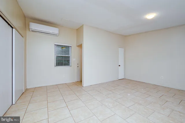 a view of an empty room with window