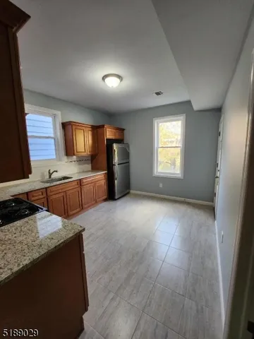 a view of kitchen and windows