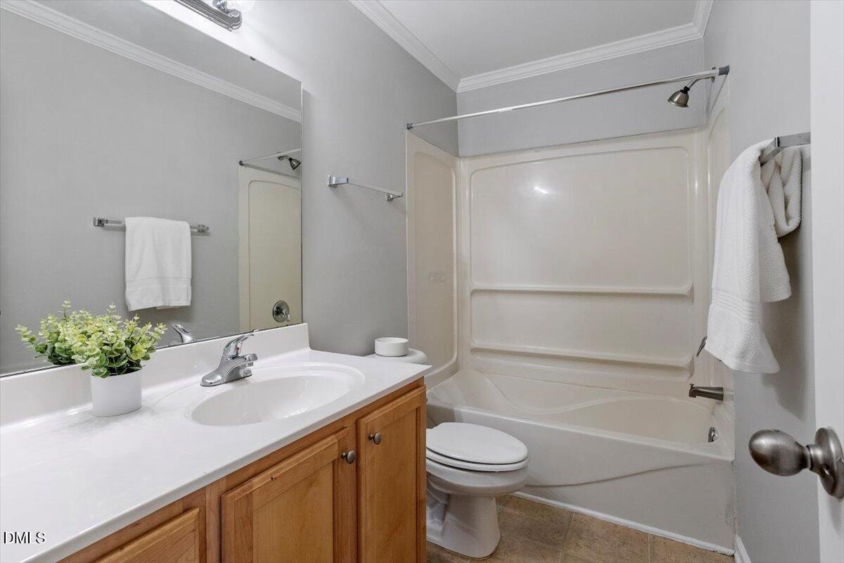 2308 Myron Drive, Unit 201 Raleigh, NC 27607 - Photo 24 of 29 a bathroom with a sink toilet and shower