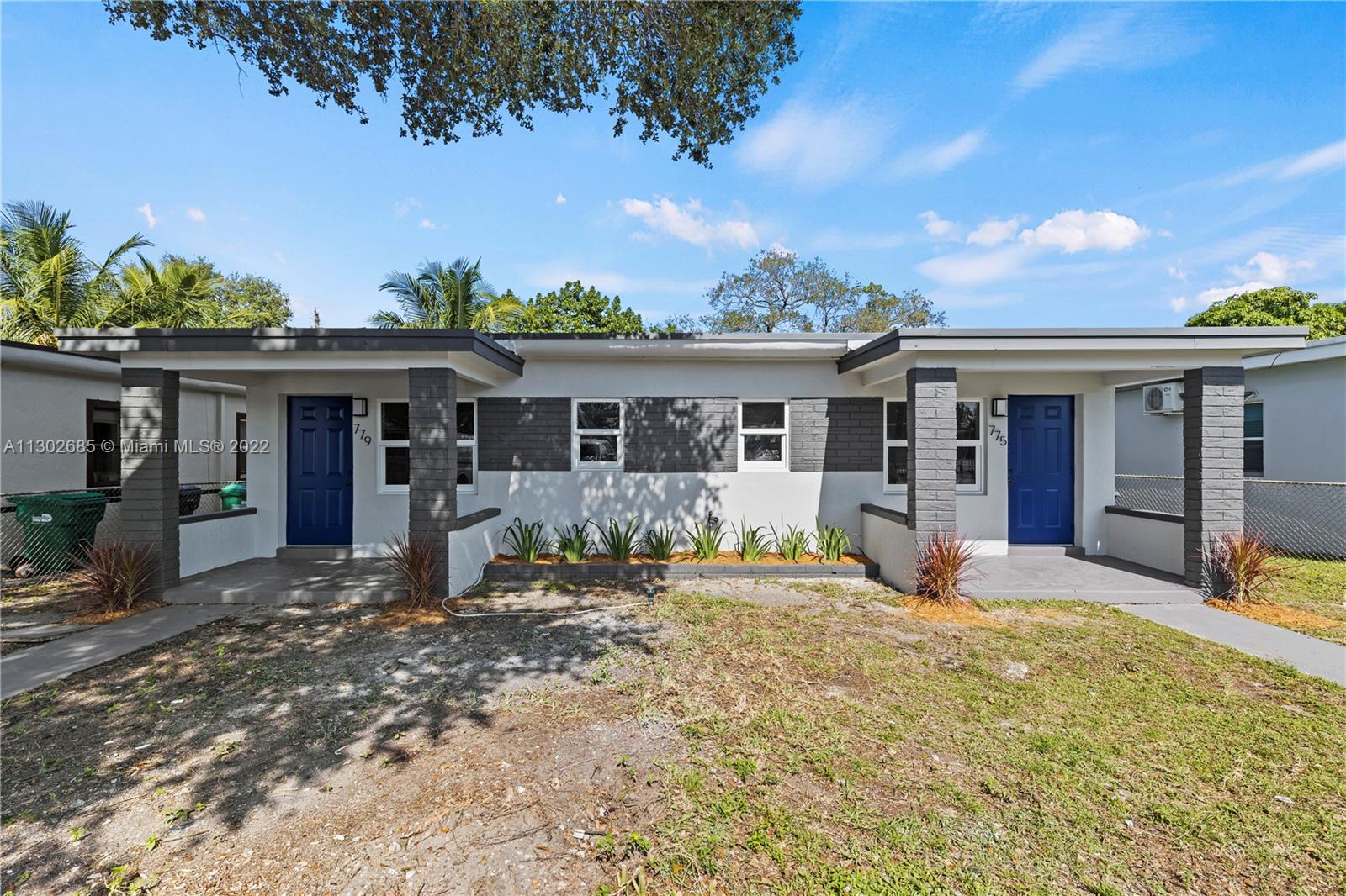 front view of a house with a patio