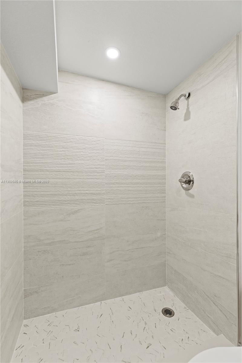 Pinewood Miami, FL 33150 - Photo 17 of 20 a bathroom with a shower