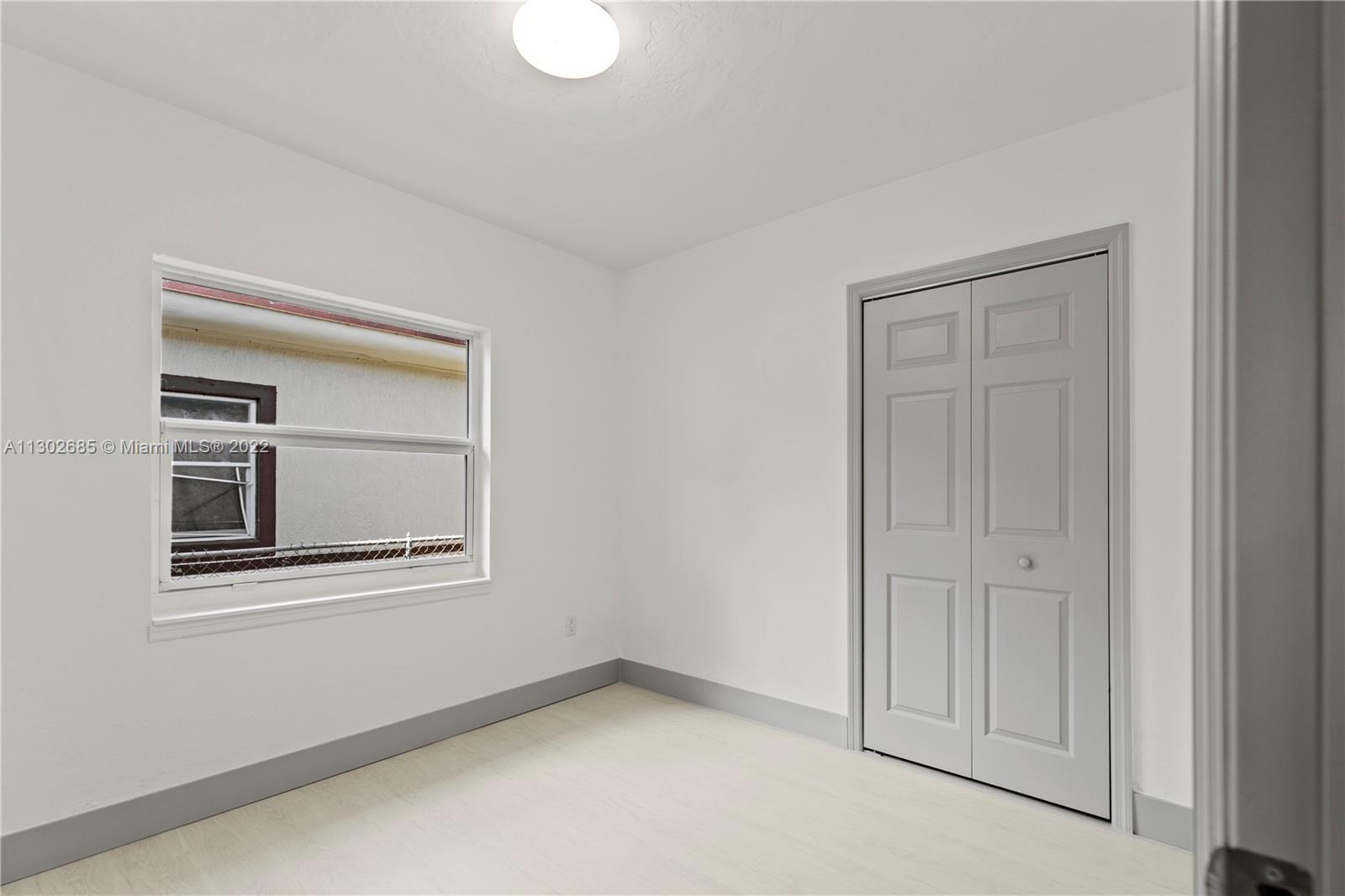 Pinewood Miami, FL 33150 - Photo 5 of 20 a view of empty room with windows