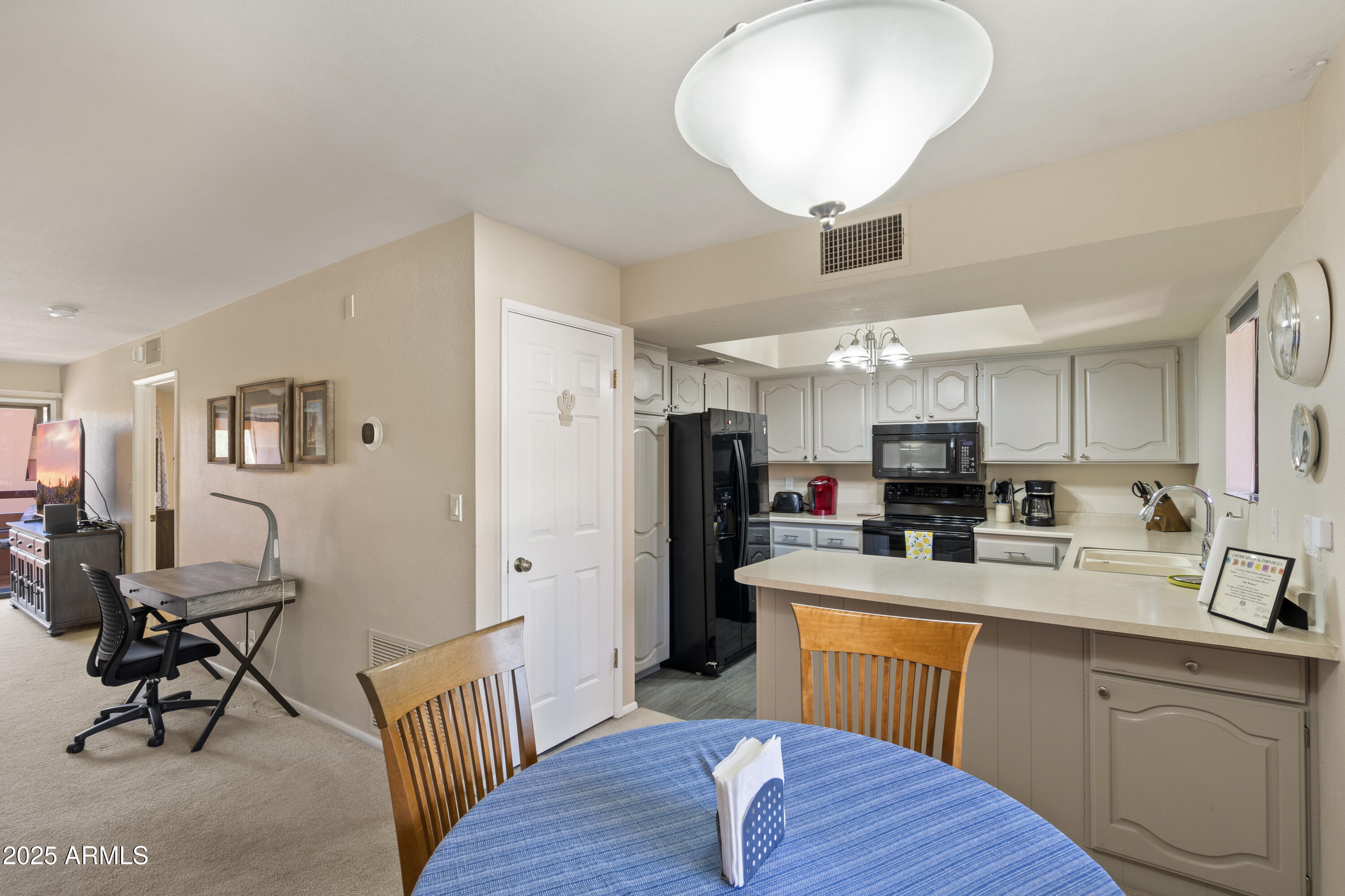 4303 East Cactus Road, Unit 222 Phoenix, AZ 85032 - Photo 11 of 38 Kitchen and dining area
