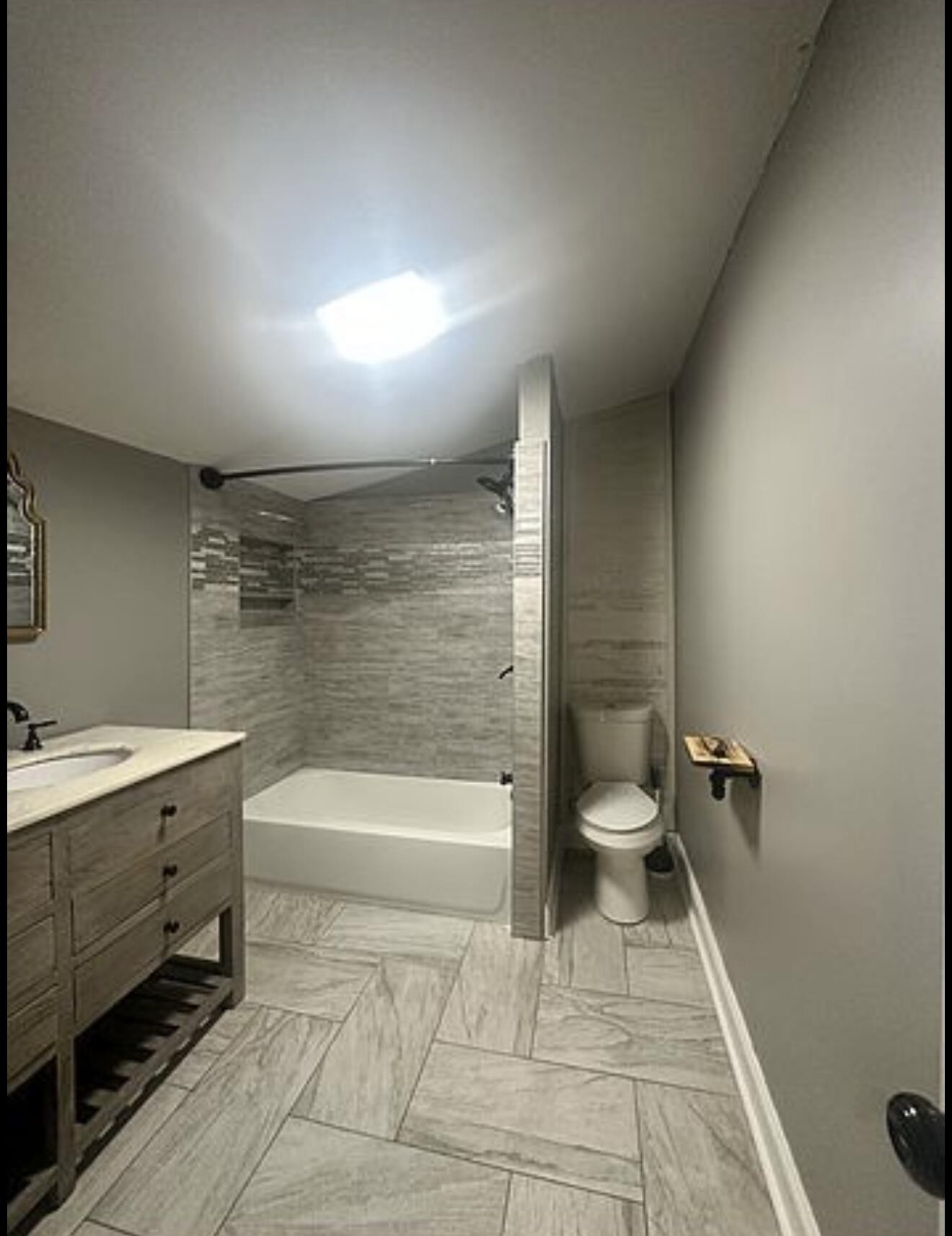 120 7th Street Calhoun, TN 37309 - Photo 13 of 17 a bathroom with a sink a toilet and shower