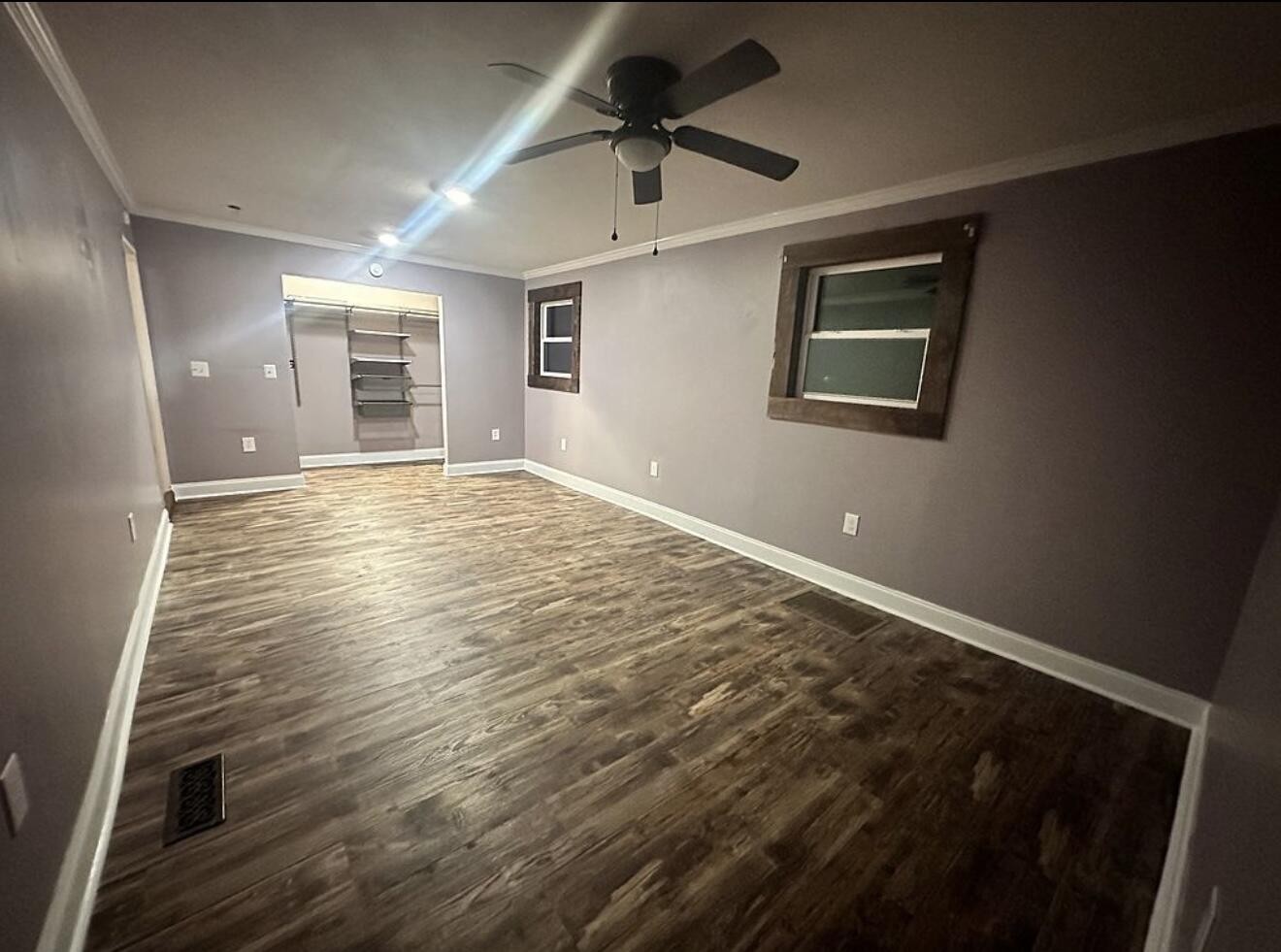 120 7th Street Calhoun, TN 37309 - Photo 8 of 17 a view of an empty room with a window and a kitchen