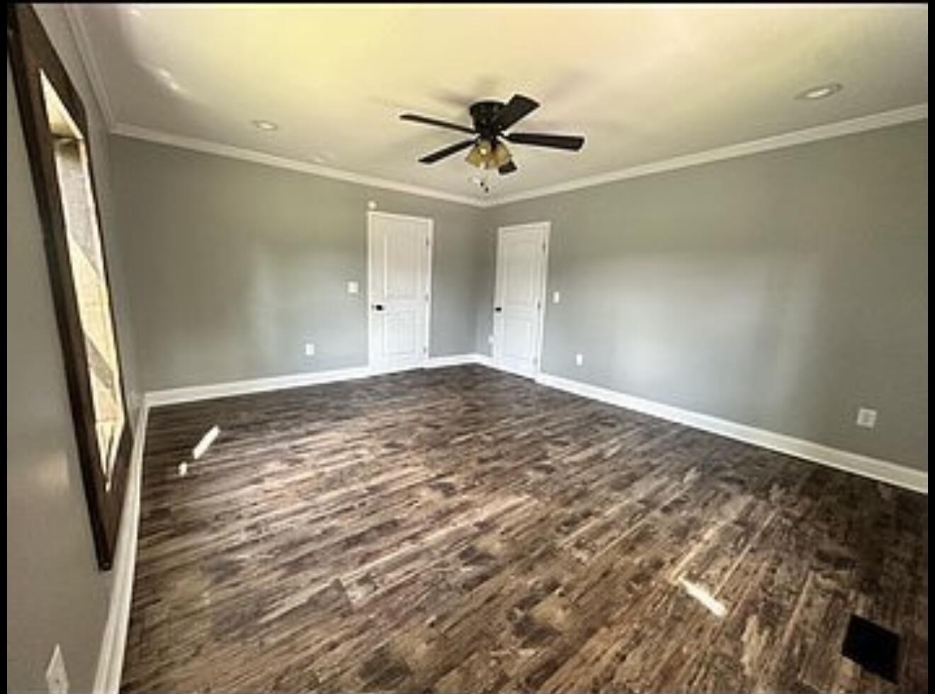 120 7th Street Calhoun, TN 37309 - Photo 10 of 17 a view of a livingroom with a ceiling fan and window
