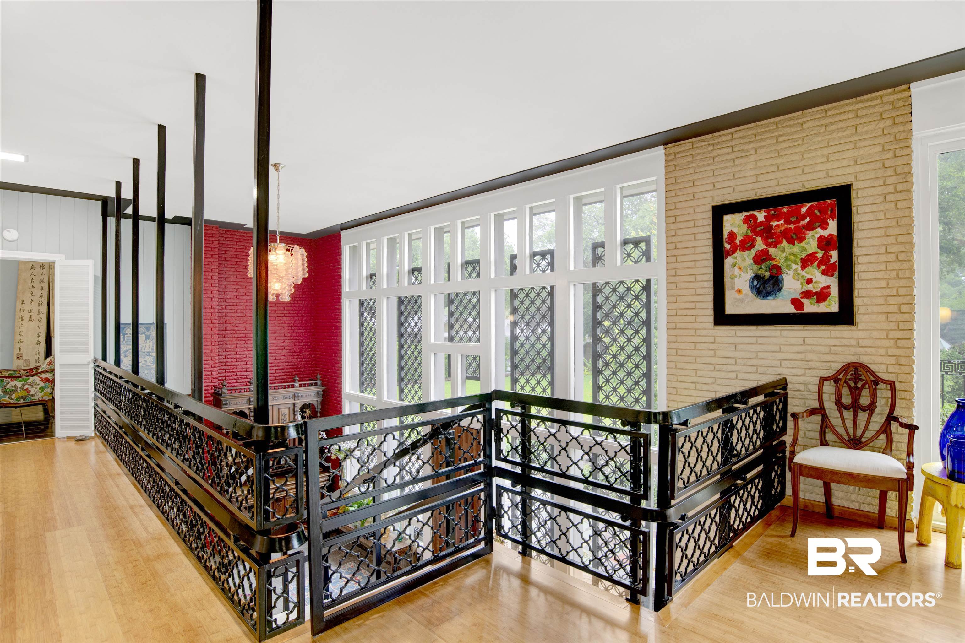 809 Bernard Circle Mobile, AL 36693 - Photo 24 of 75 Open landing featuring light wood-finish flooring and black decorative railings