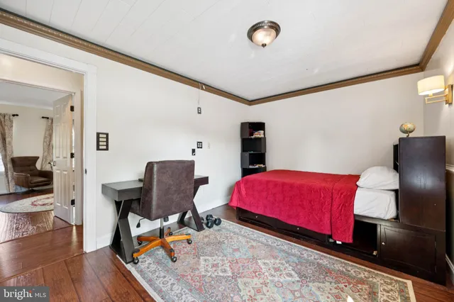 a room with furniture and a rug