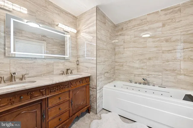 a bathroom with a sink and a bathtub
