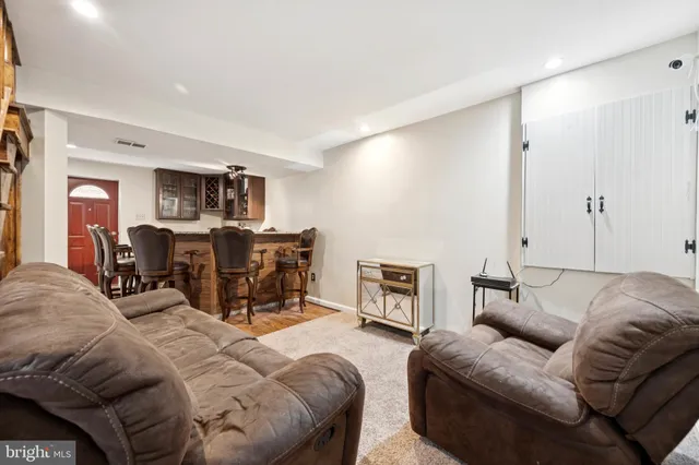 a bed room with a bed and furniture