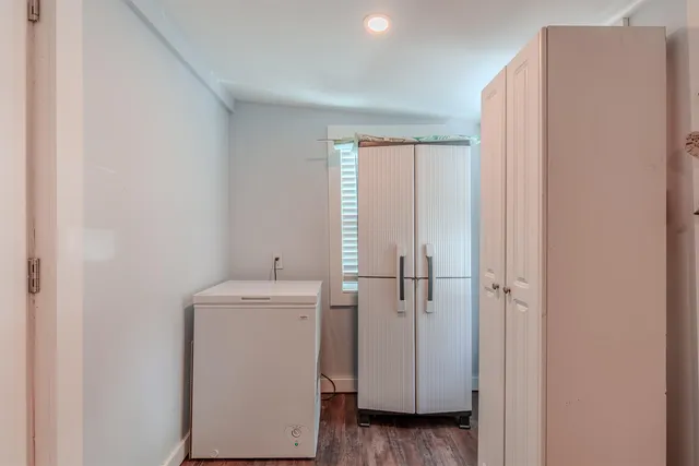 a view of hallway with washer and dryer