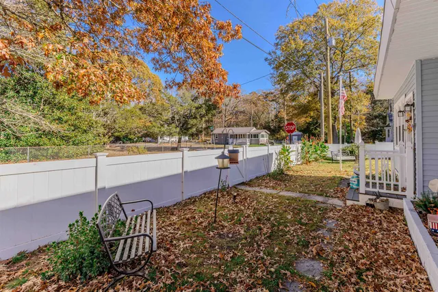 a view of a pathway with a yard